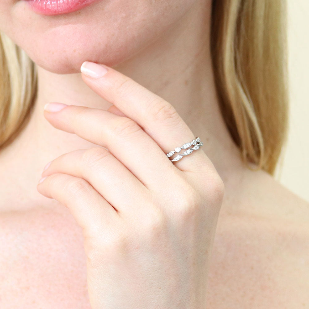 Model wearing Woven Bubble Bezel Set CZ Eternity Ring Set in Sterling Silver