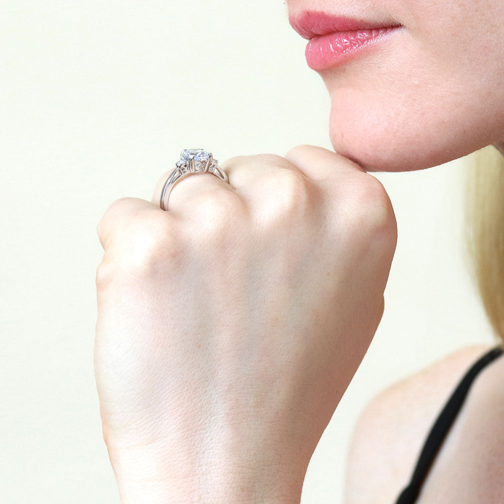 Model wearing 3-Stone Oval CZ Ring in Sterling Silver