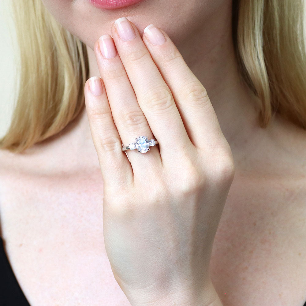 Model wearing 3-Stone Oval CZ Ring in Sterling Silver