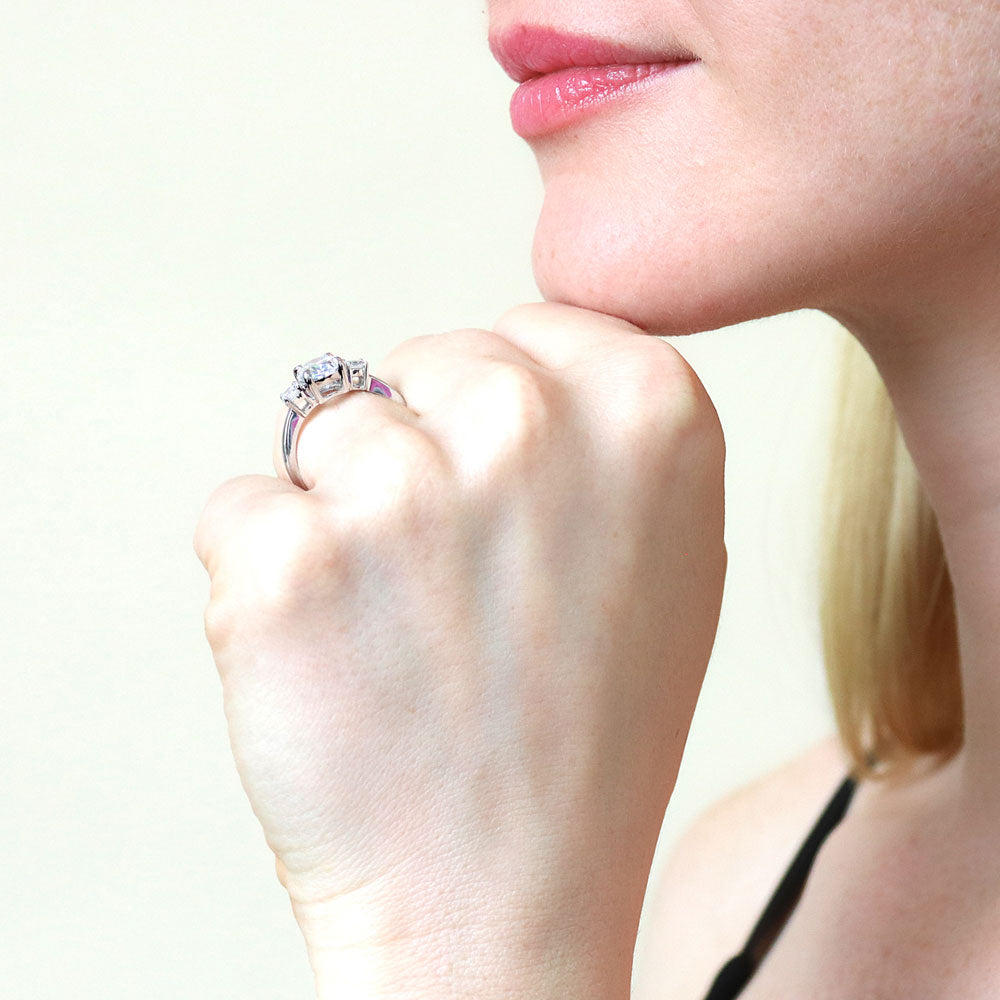 Model wearing 3-Stone Oval CZ Ring in Sterling Silver