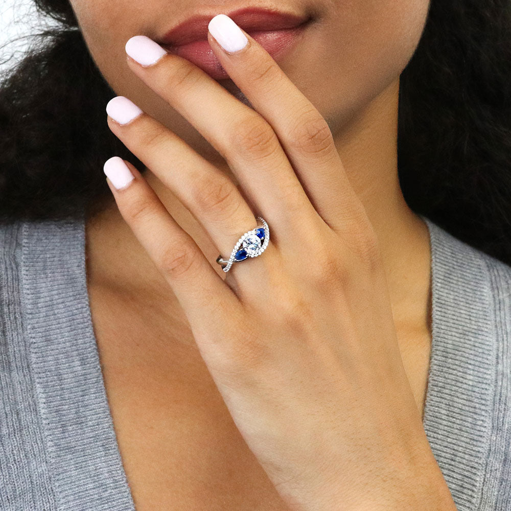 Model wearing 3-Stone Woven Round CZ Ring in Sterling Silver