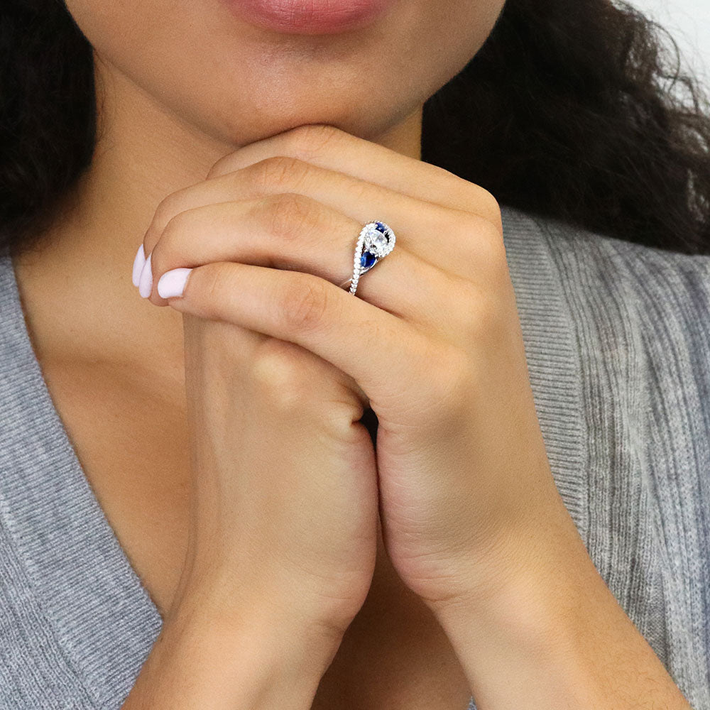 Model wearing 3-Stone Woven Round CZ Ring in Sterling Silver