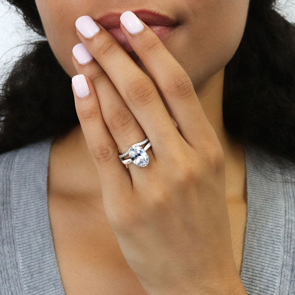 Model wearing Solitaire 3ct Oval CZ Statement Ring Set in Sterling Silver