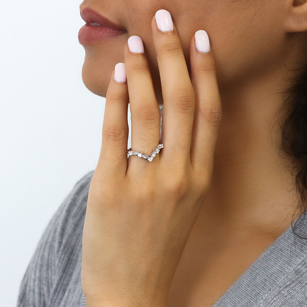 Model wearing Chevron Halo Simulated Blue Sapphire CZ Ring Set in Sterling Silver