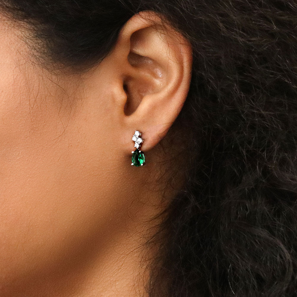 Model wearing Cluster Simulated Emerald CZ Set in Sterling Silver