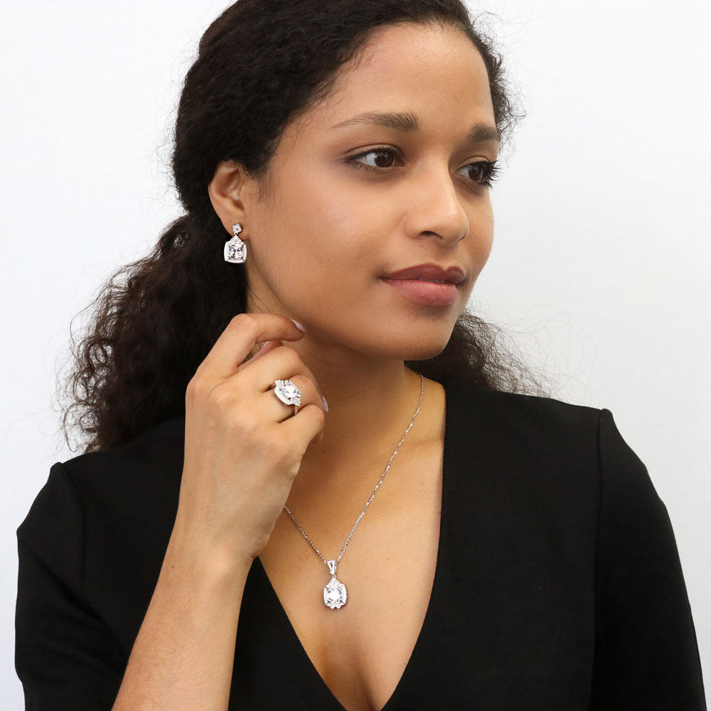 Model wearing Halo Arrow Cushion CZ Statement Ring in Sterling Silver