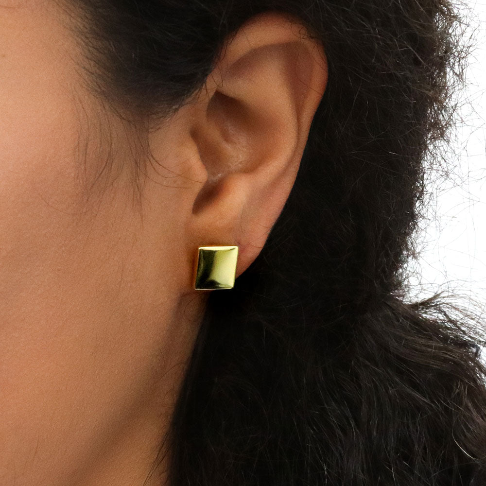 Model wearing Square Stud Earrings in Sterling Silver