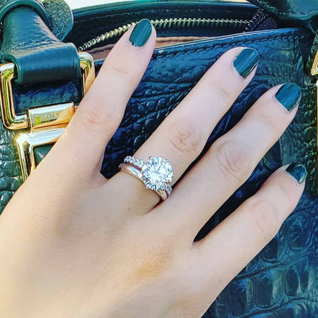 Image Contain: Model Wearing Band, Solitaire with Side Stones Ring