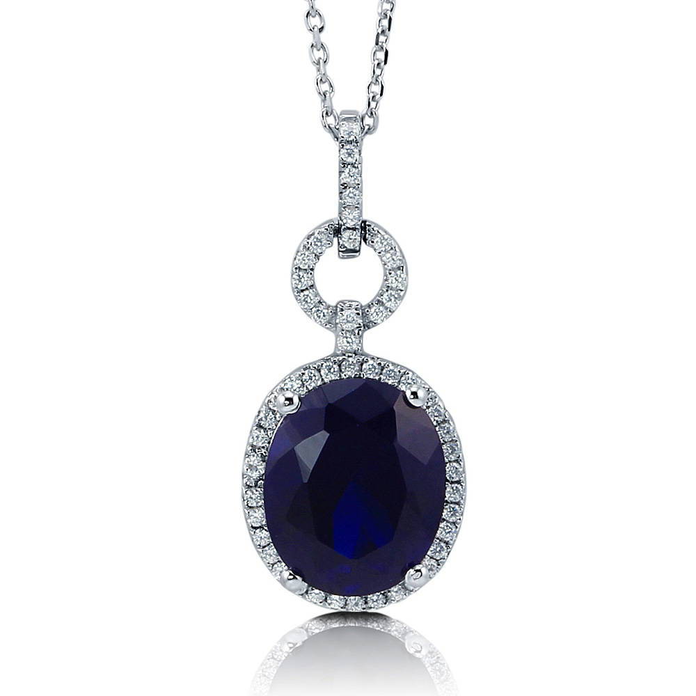 Halo Simulated Blue Sapphire Oval CZ Necklace in Sterling Silver