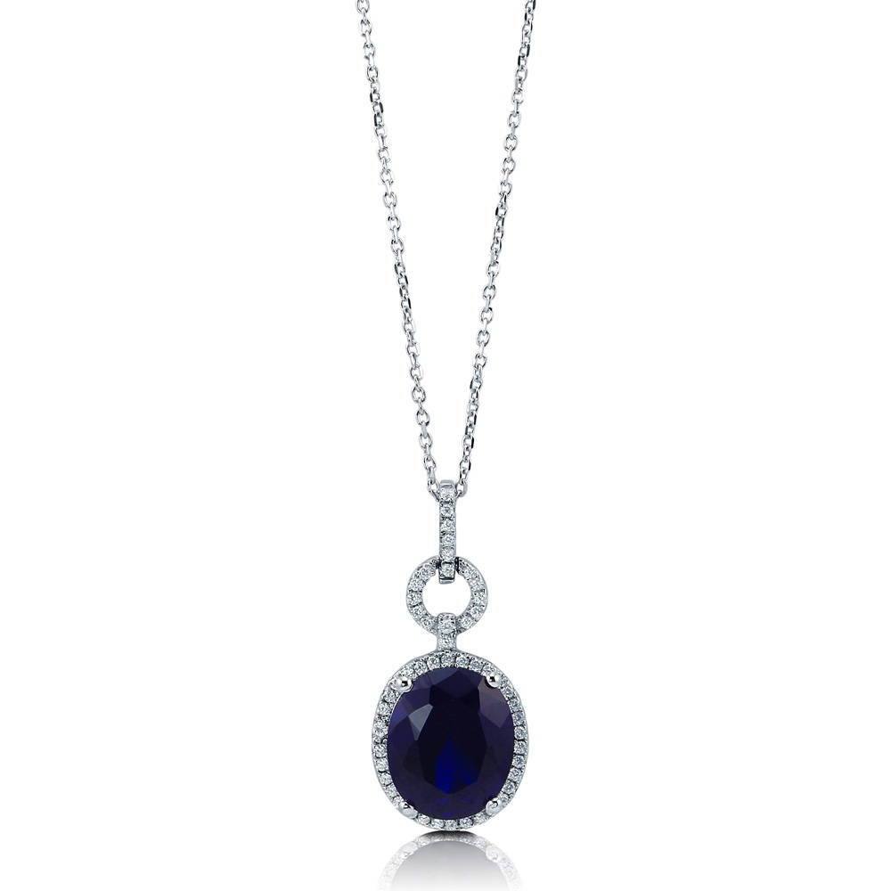 Front view of Halo Simulated Blue Sapphire Oval CZ Necklace in Sterling Silver, 4 of 7