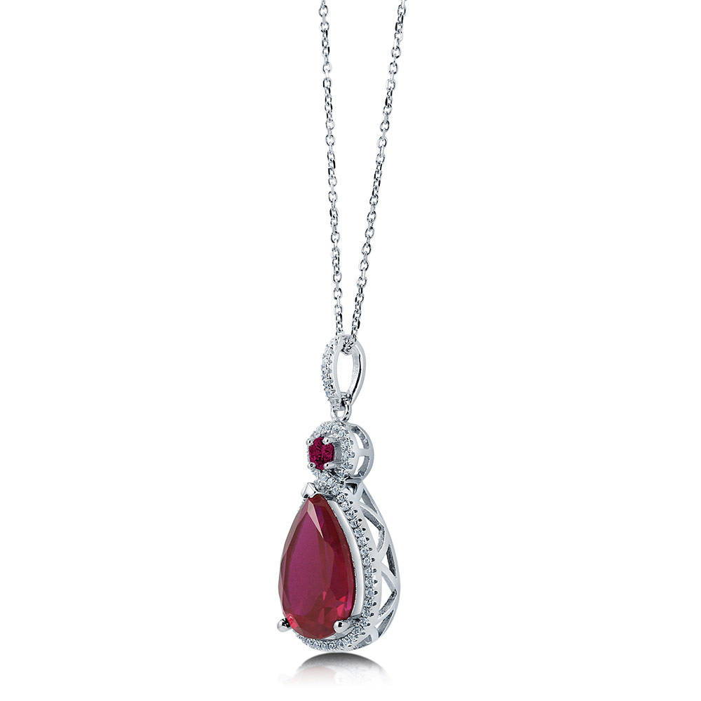 Angle view of Halo Simulated Ruby Pear CZ Pendant Necklace in Sterling Silver, 4 of 6