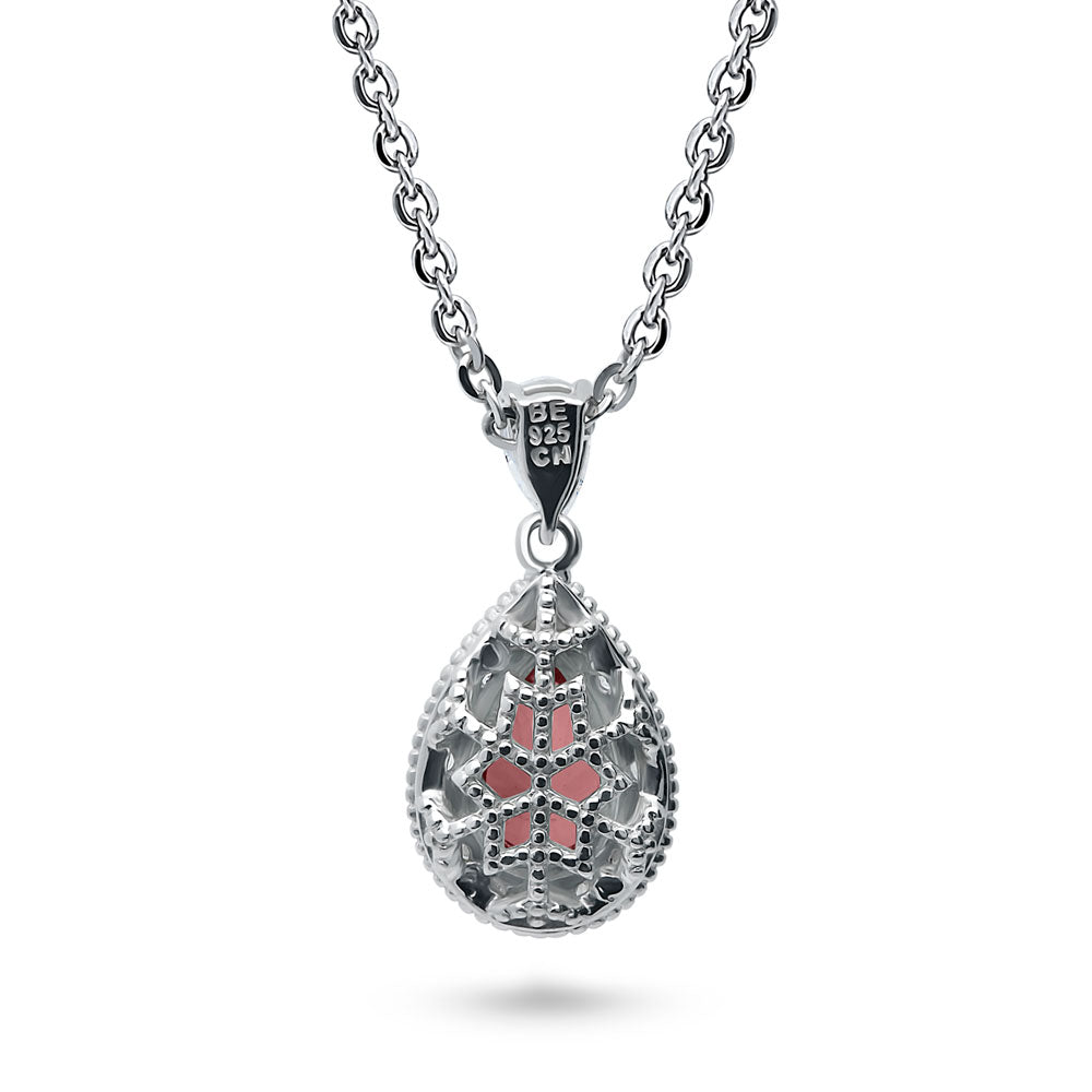 Angle view of Halo Red Pear CZ Pendant Necklace in Sterling Silver