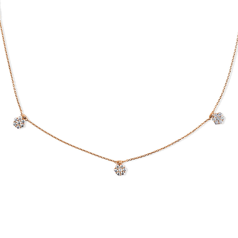 Side view of Flower CZ Station Necklace in Rose Gold Flashed Sterling Silver