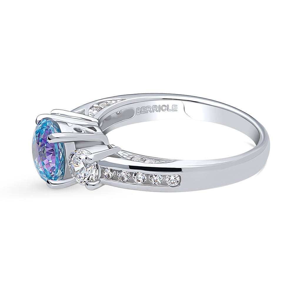 Angle view of 3-Stone Kaleidoscope Purple Aqua Round CZ Ring in Sterling Silver