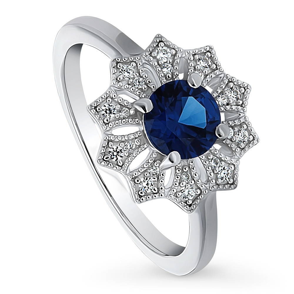 Front view of Flower Halo Blue CZ Ring in Sterling Silver