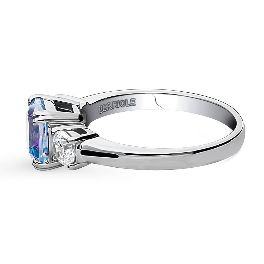 Angle view of 3-Stone Kaleidoscope Purple Aqua Cushion CZ Ring in Sterling Silver