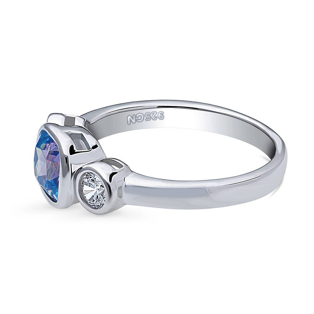 Angle view of 3-Stone Kaleidoscope Purple Aqua Cushion CZ Ring in Sterling Silver