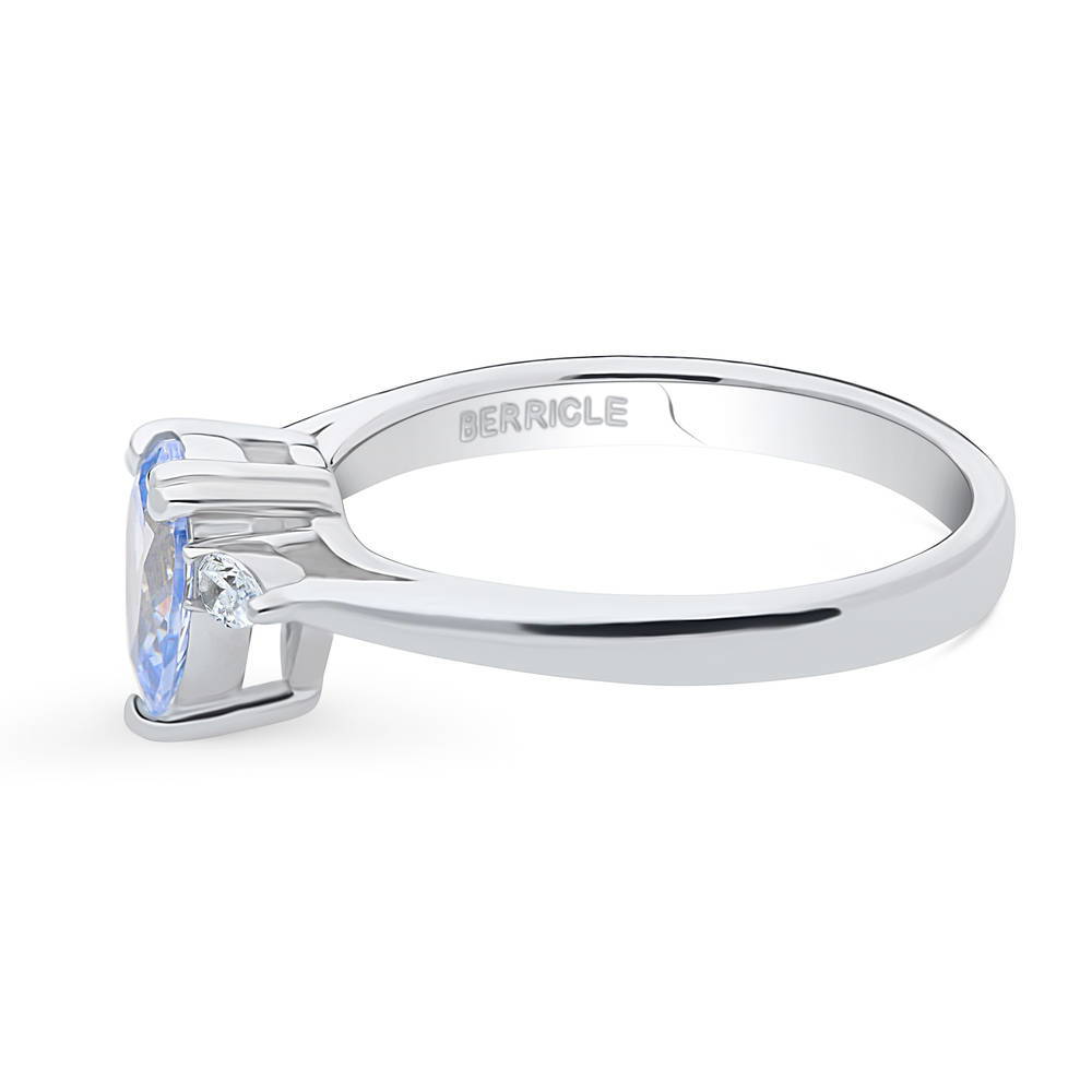 Angle view of 3-Stone Greyish Blue Pear CZ Ring in Sterling Silver