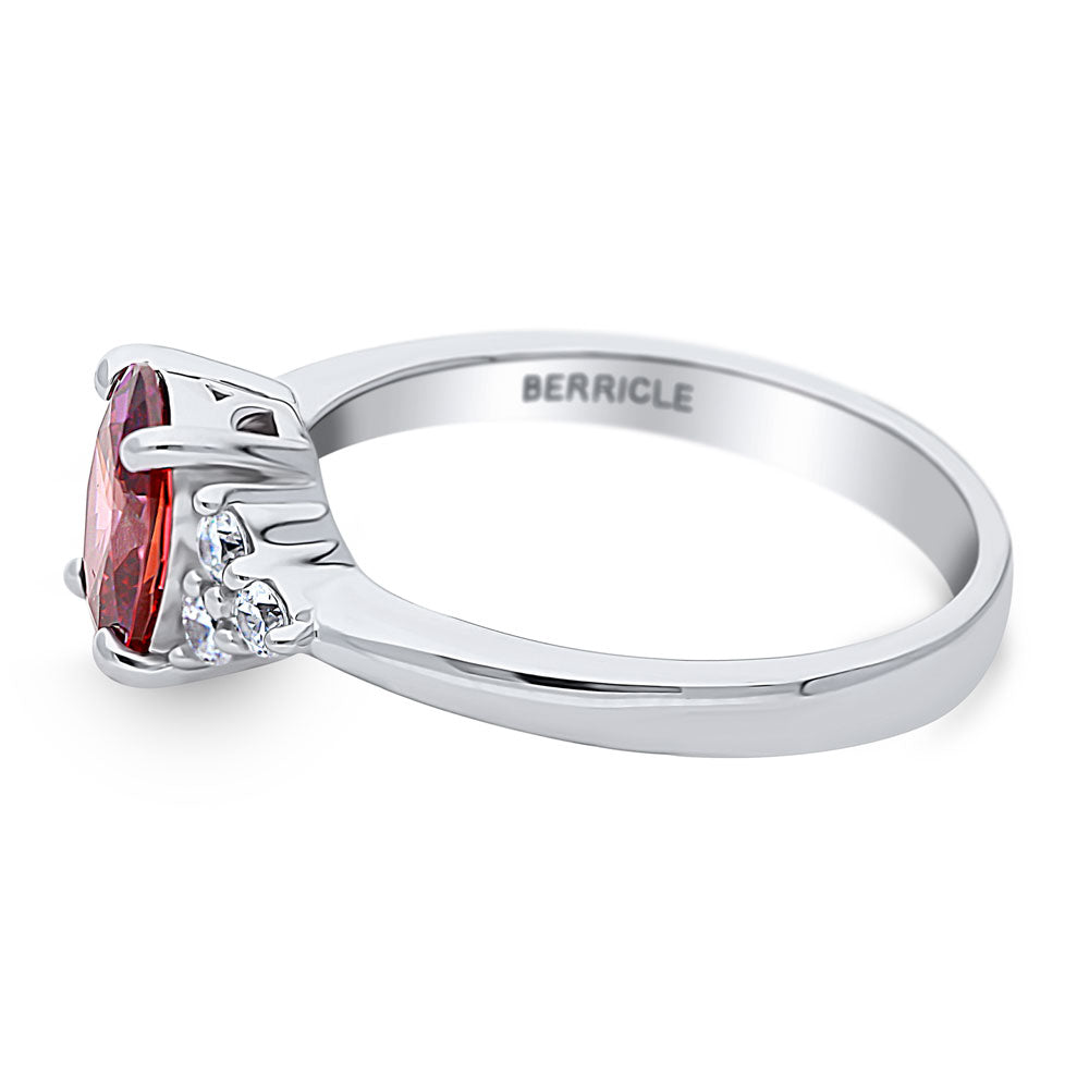 Angle view of Solitaire Red Oval CZ Ring in Sterling Silver 1.2ct