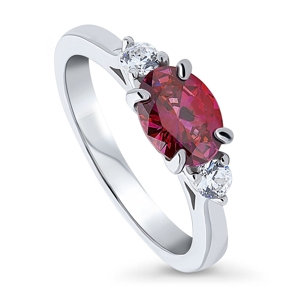 Front view of 3-Stone East-West Red Oval CZ Ring in Sterling Silver, 4 of 8