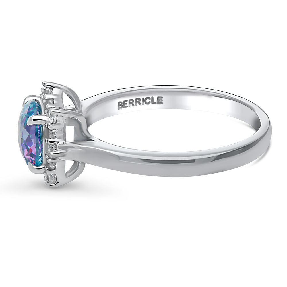 Angle view of Halo Sunburst Purple Aqua Round CZ Ring in Sterling Silver