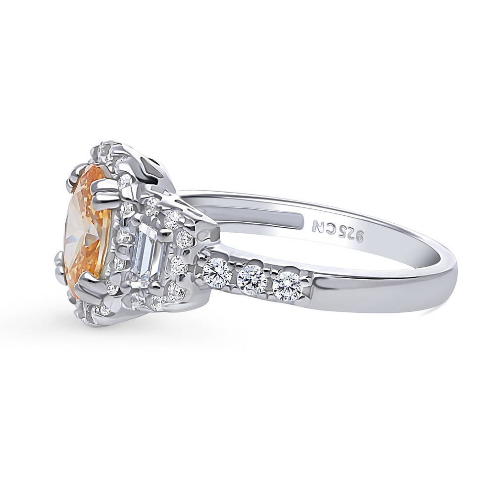 Angle view of 3-Stone Halo Yellow Oval CZ Ring in Sterling Silver
