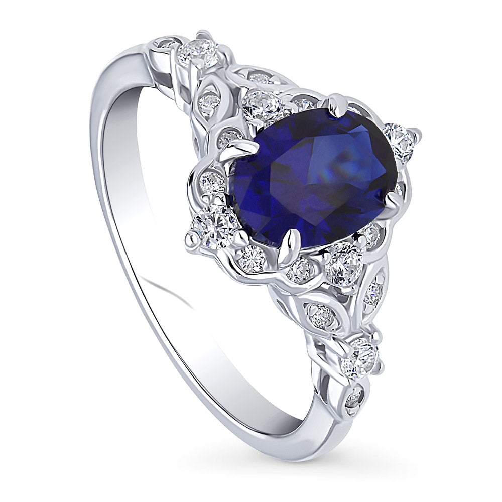 Front view of Halo Art Deco Simulated Blue Sapphire Oval CZ Ring in Sterling Silver