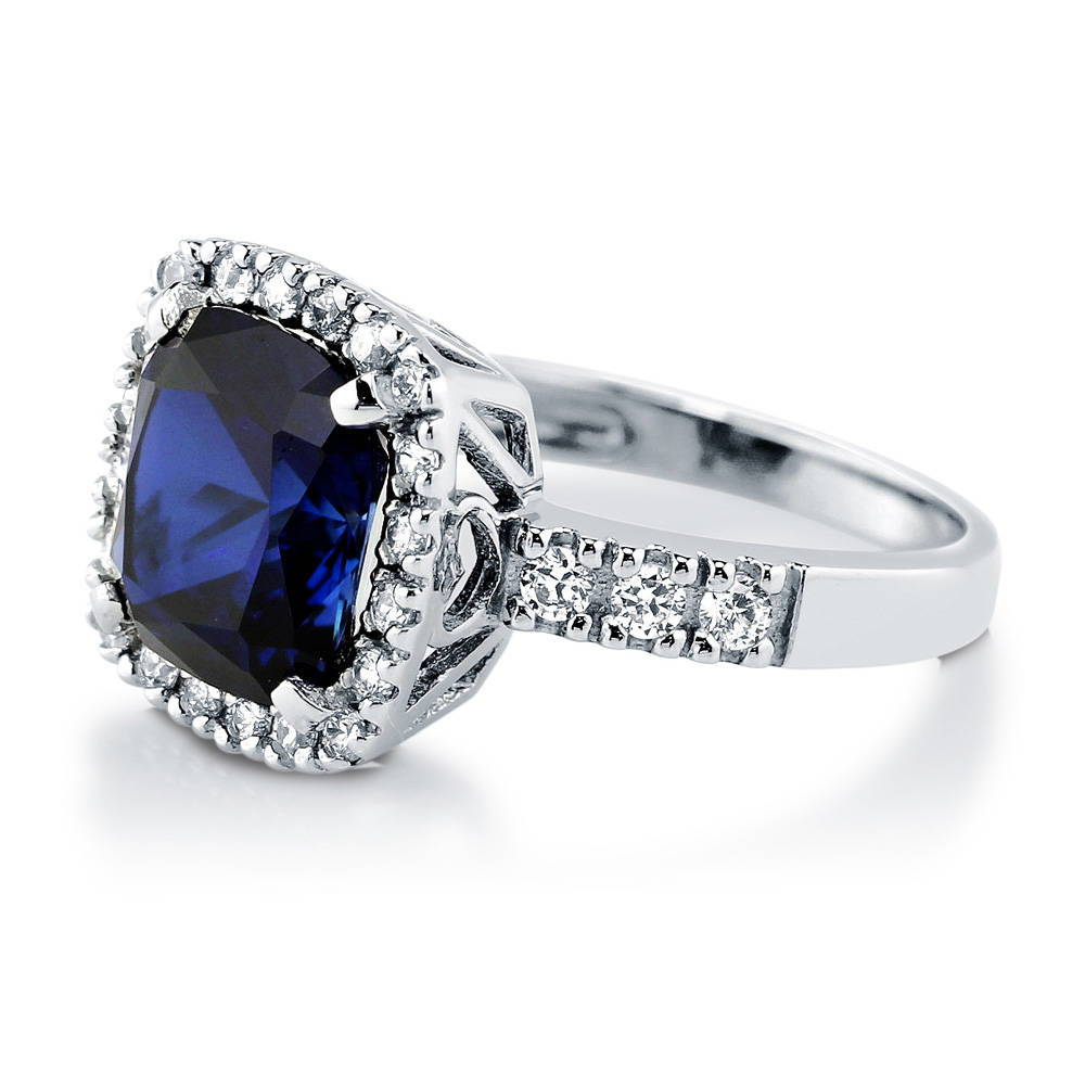 Angle view of Halo Simulated Blue Sapphire Cushion CZ Ring in Sterling Silver