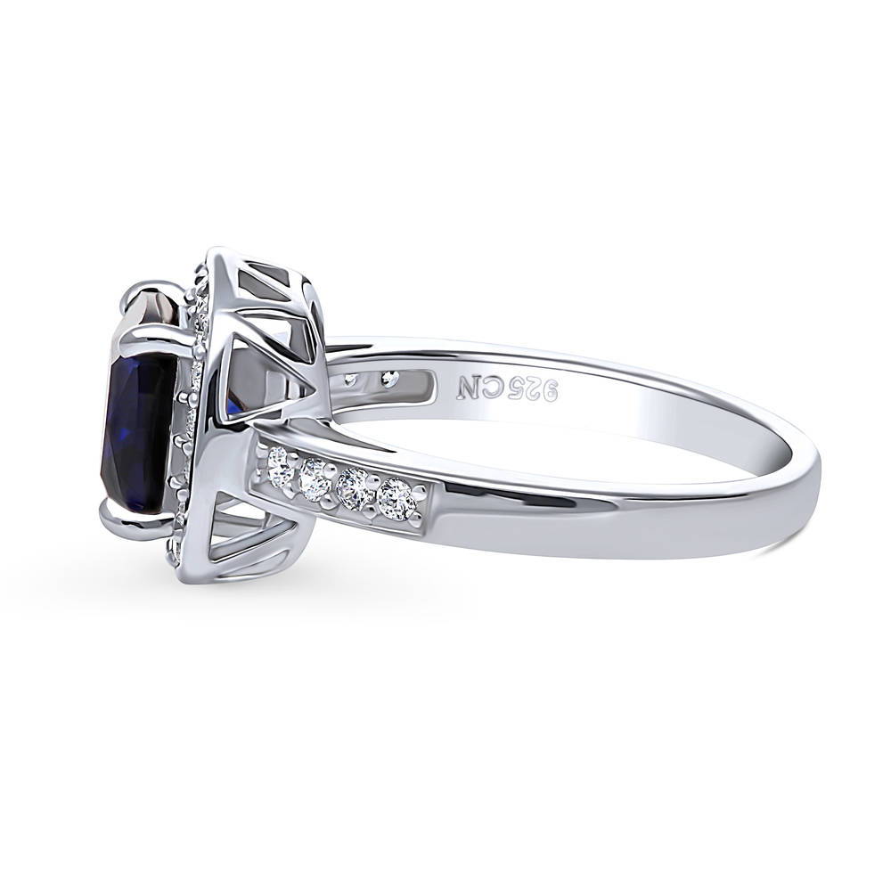 Angle view of Halo Simulated Blue Sapphire Cushion CZ Ring in Sterling Silver