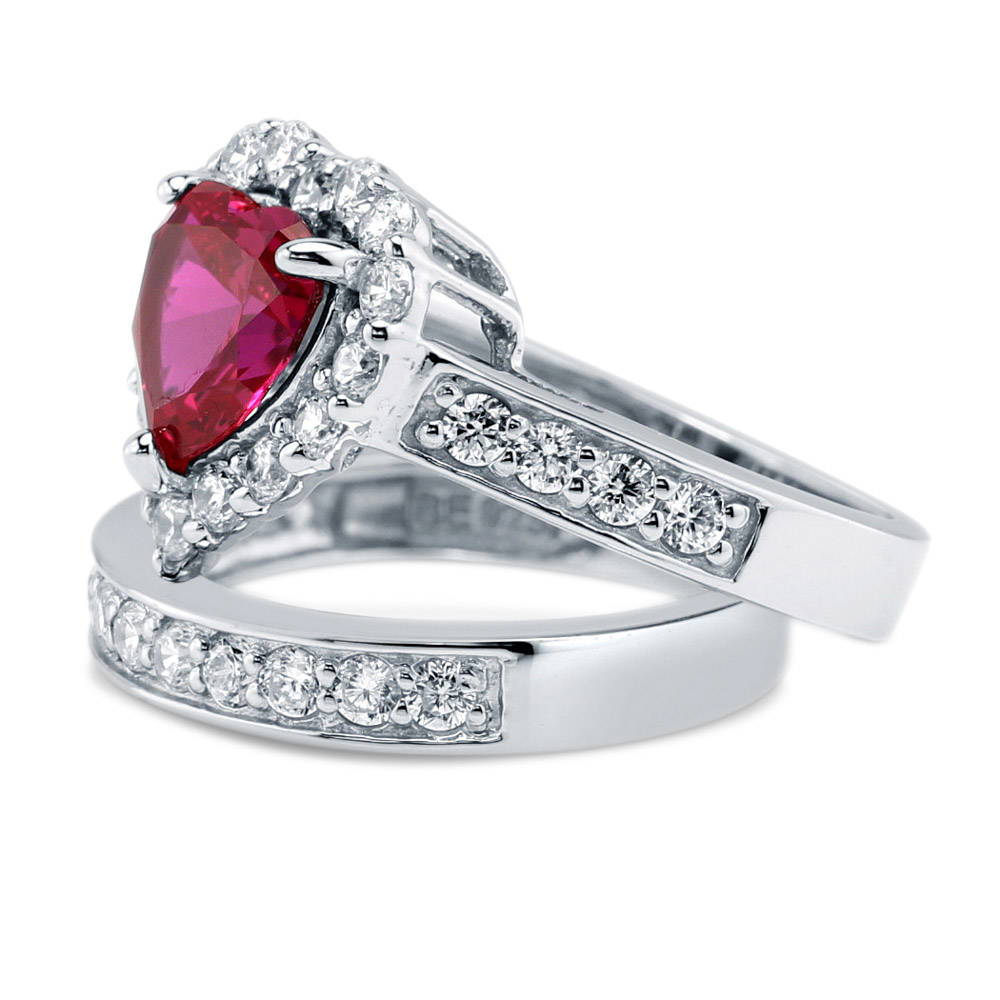 Angle view of Halo Heart Simulated Ruby CZ Statement Ring Set in Sterling Silver
