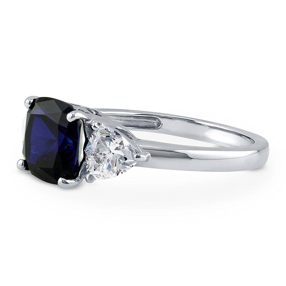 Angle view of 3-Stone Simulated Blue Sapphire Cushion CZ Ring in Sterling Silver