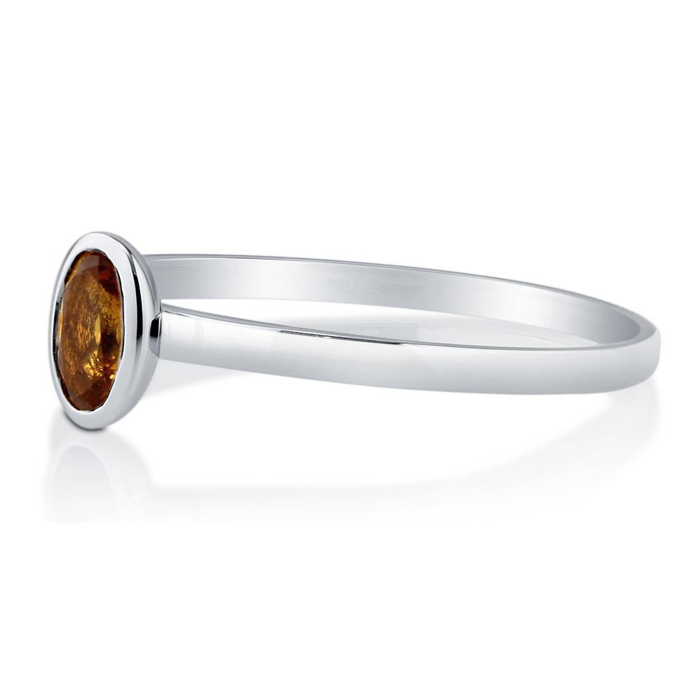 Angle view of Solitaire Bezel Set Oval Citrine Ring in 10K White Gold, 4 of 6