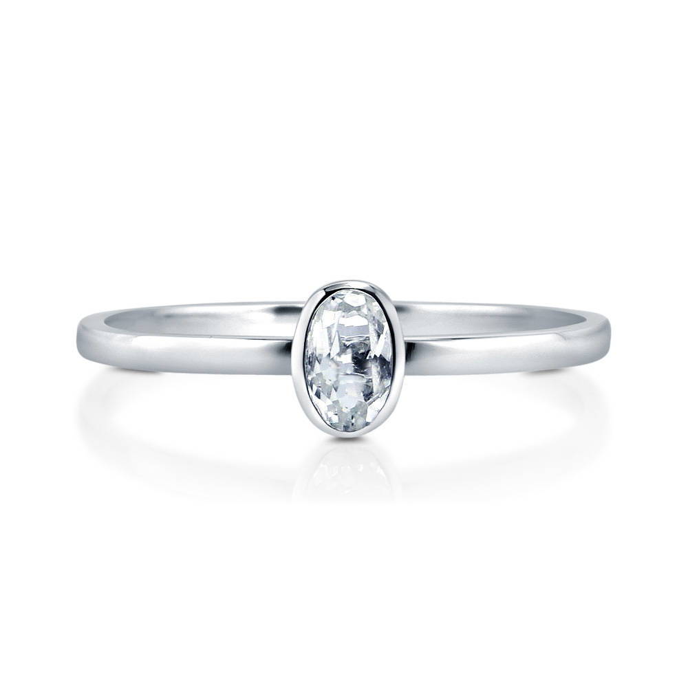 Solitaire Bezel Set Oval Topaz Ring in 10K White Gold