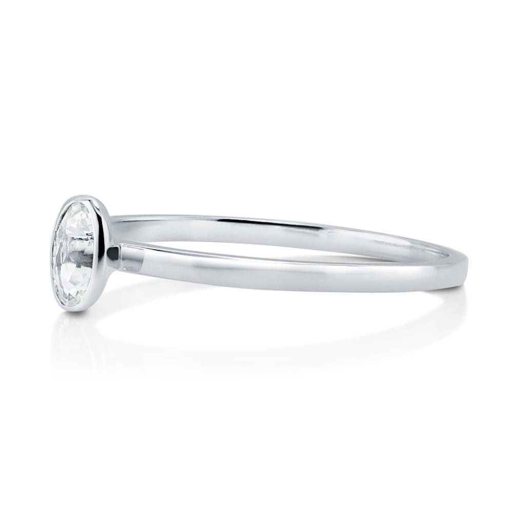Solitaire Bezel Set Oval Topaz Ring in 10K White Gold
