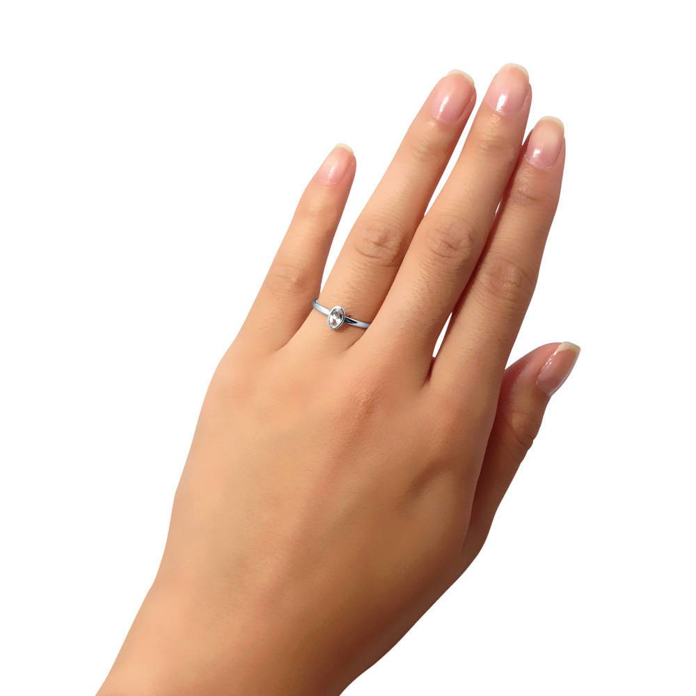 Solitaire Bezel Set Oval Topaz Ring in 10K White Gold