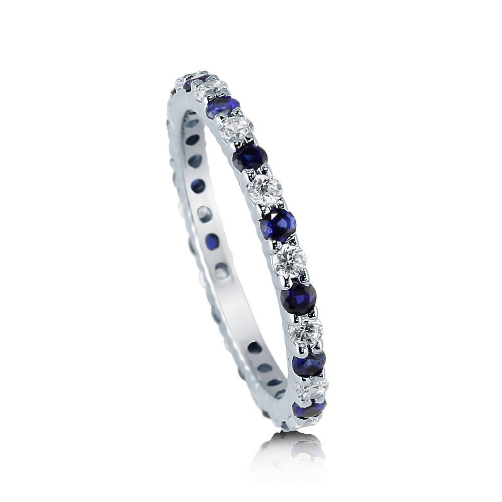 Simulated Blue Sapphire Pave Set CZ Eternity Ring in Sterling Silver, front view