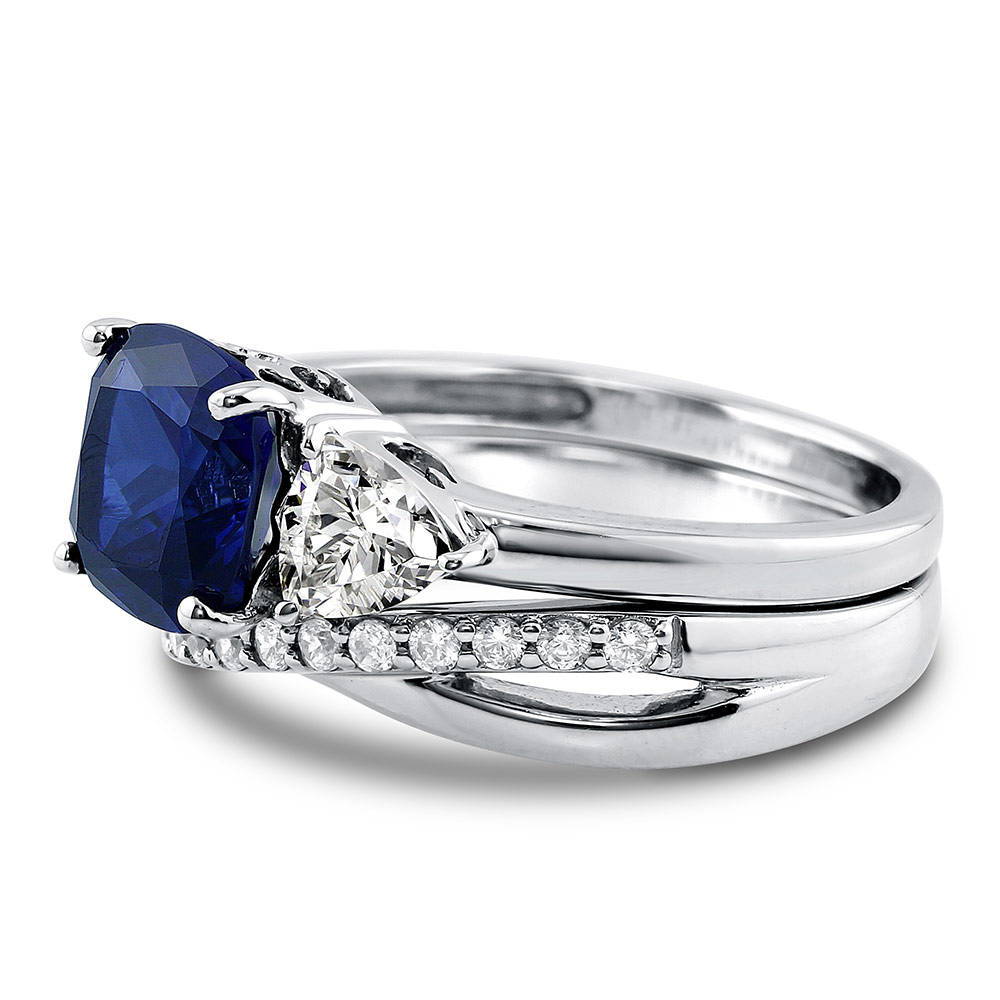 Angle view of 3-Stone Simulated Blue Sapphire Cushion CZ Ring Set in Sterling Silver