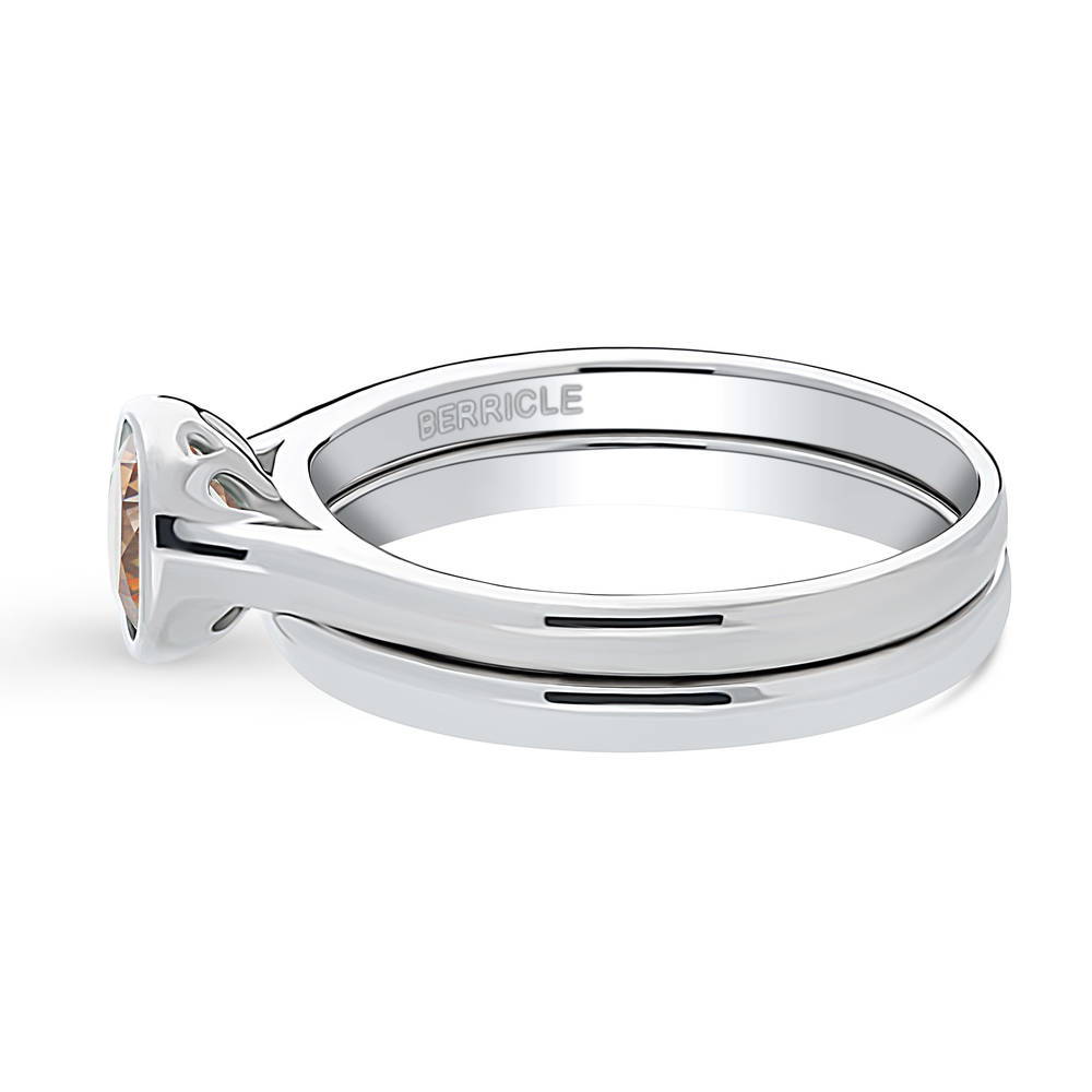 Angle view of Solitaire 0.8ct Caramel Bezel Set Round CZ Ring Set in Sterling Silver