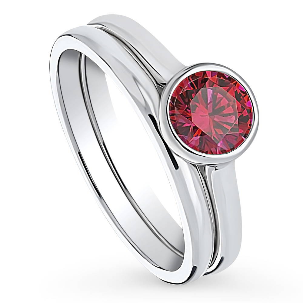 Front view of Solitaire 0.8ct Red Bezel Set Round CZ Ring Set in Sterling Silver