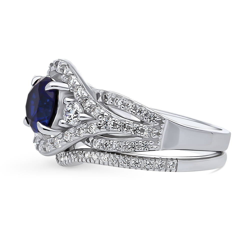 Angle view of 3-Stone Simulated Blue Sapphire Round CZ Ring Set in Sterling Silver