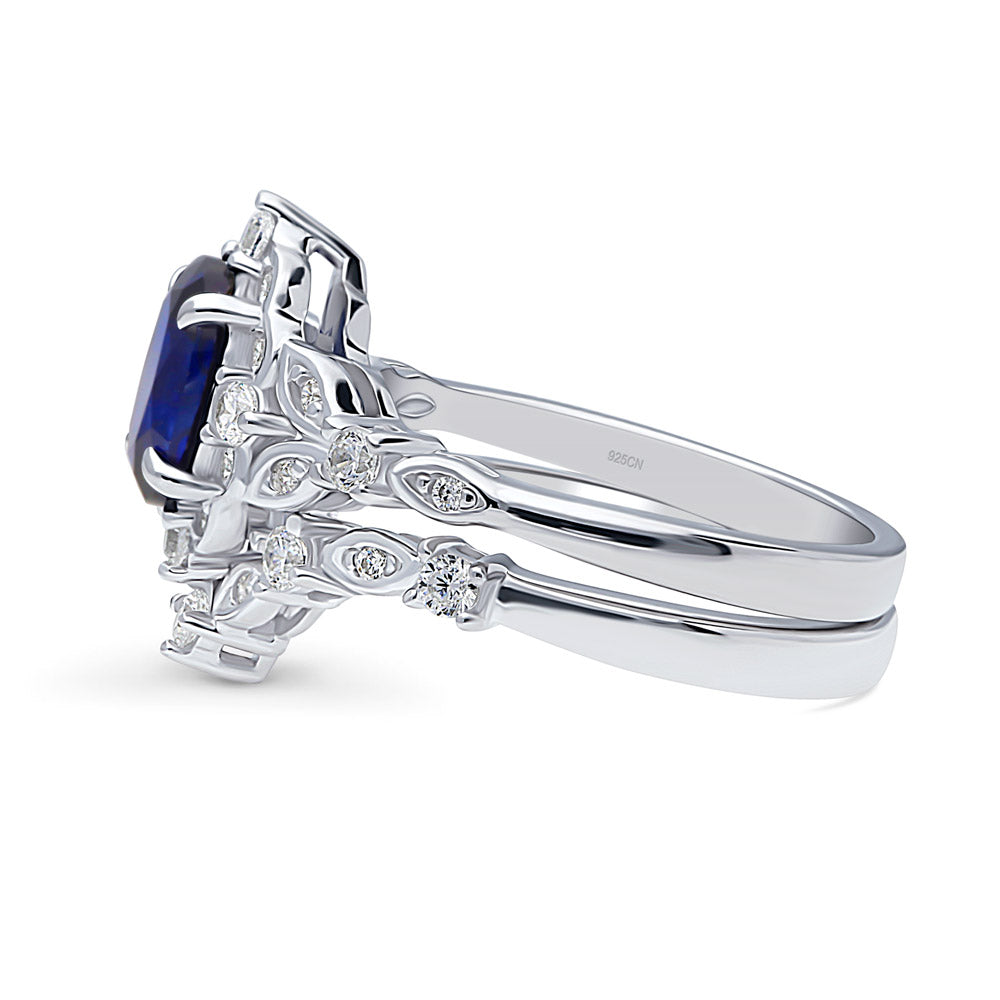 Chevron Halo Simulated Blue Sapphire CZ Ring Set in Sterling Silver