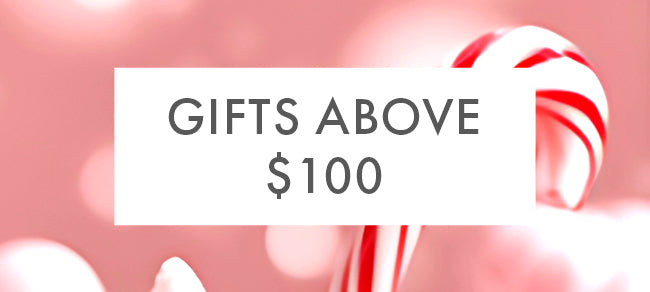 Promotional banner with 'Gifts Above $100' text on a pink background with candy cane design.
