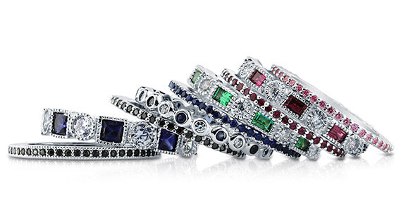 Simulated emerald, sapphire and ruby eternity rings