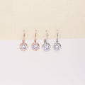 Flatlay view of Solitaire 1.2ct Bezel CZ Leverback Earrings in Sterling Silver, Yellow Gold Flashed