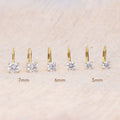 Flatlay view of Solitaire CZ Leverback Earrings in Gold Flashed Sterling Silver