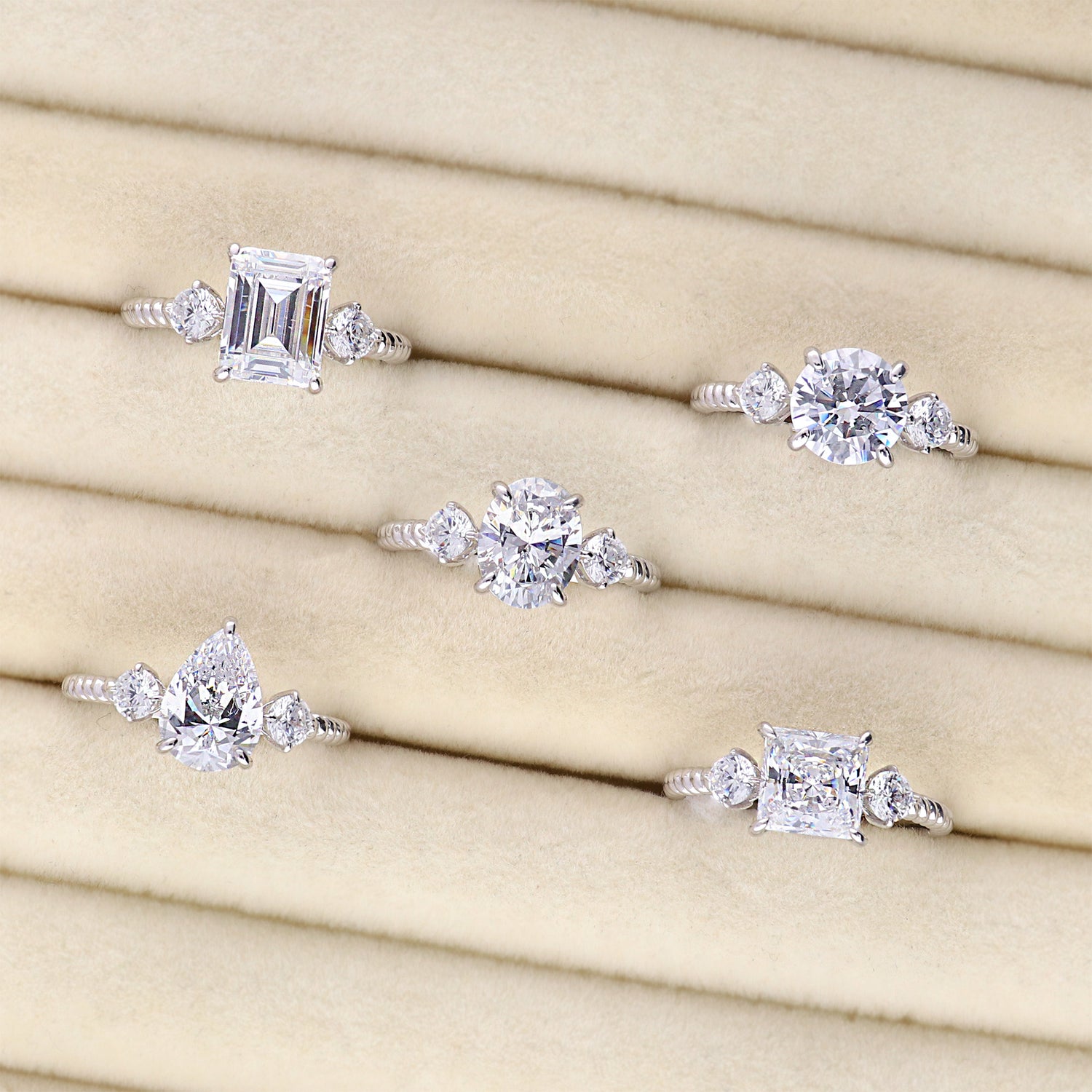 Flatlay view of 3-Stone Woven 1.8ct Pear CZ Ring in Sterling Silver, 9 of 10