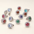 Flatlay view of Halo Kaleidoscope CZ Stud Earrings in Sterling Silver