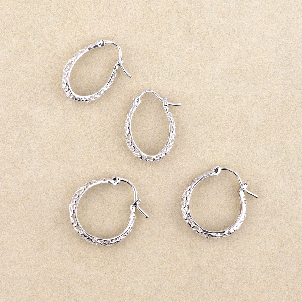 Flatlay view of Oval Filigree Small Hoop Earrings in Sterling Silver 0.8 inch, 5 of 6