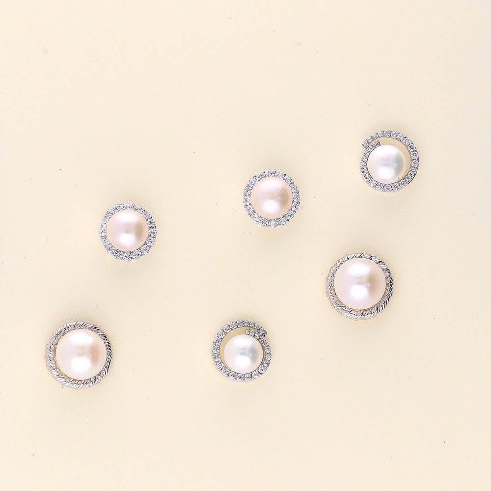 Flatlay view of Halo White Button Cultured Pearl Stud Earrings in Sterling Silver, 4 of 5
