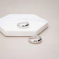 Flatlay view of Dome Small Hoop Earrings in Sterling Silver 0.8-1 inch, 2 Pairs, Rhodium Plated